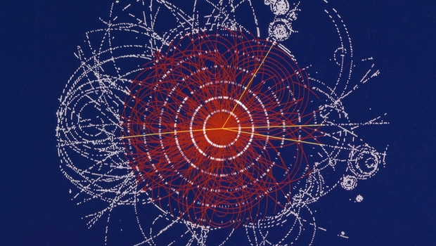 Simulation de la désintégration d’un boson Higgs en quatre muons (traces jaunes) lors de l’expérience ATLAS.